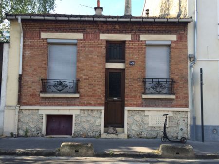 Surlvation atypique en zinc pour une maison de ville en briques  Boulogne-Billancourt