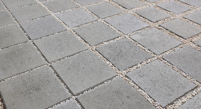 Stationner, circuler, drainer : le pavé drainant idéal pour parkings et allées de garage