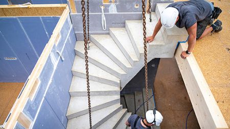 Construction hybride : comment maîtriser les liaisons entre bois, béton et acier ?