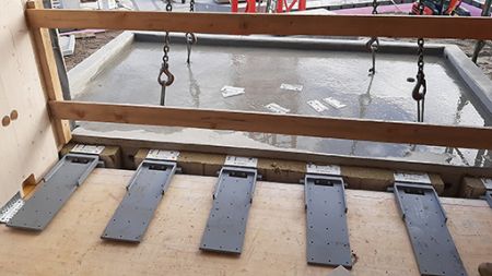 Construction hybride : comment maîtriser les liaisons entre bois, béton et acier ?
