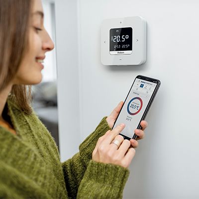 Thermostat d'Ambiance Programmable - Alimentation secteur ou  piles