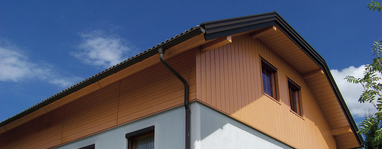 Elements de façade en aluminium coloris bois PREFA - Revêtement de façade