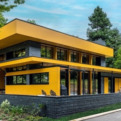 Façade en ardoise et bardage coloré : une écriture contemporaine en maison individuelle