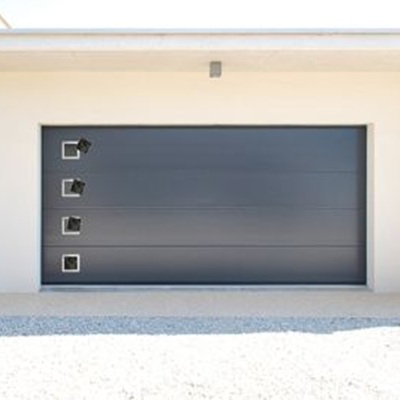Porte de garage sectionnelle plafond : allier modernité et style intemporel